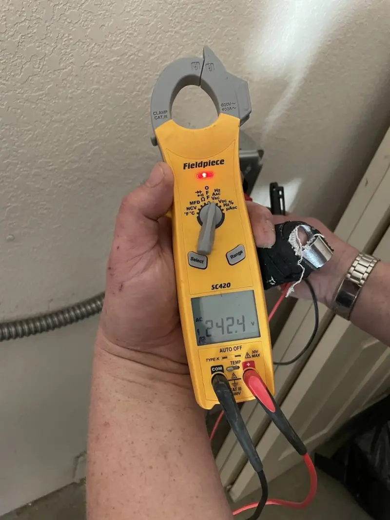 Voltage testing with clamp meter during Hot Tub / Pool Electrical Wiring in EspaÃÂ±ola